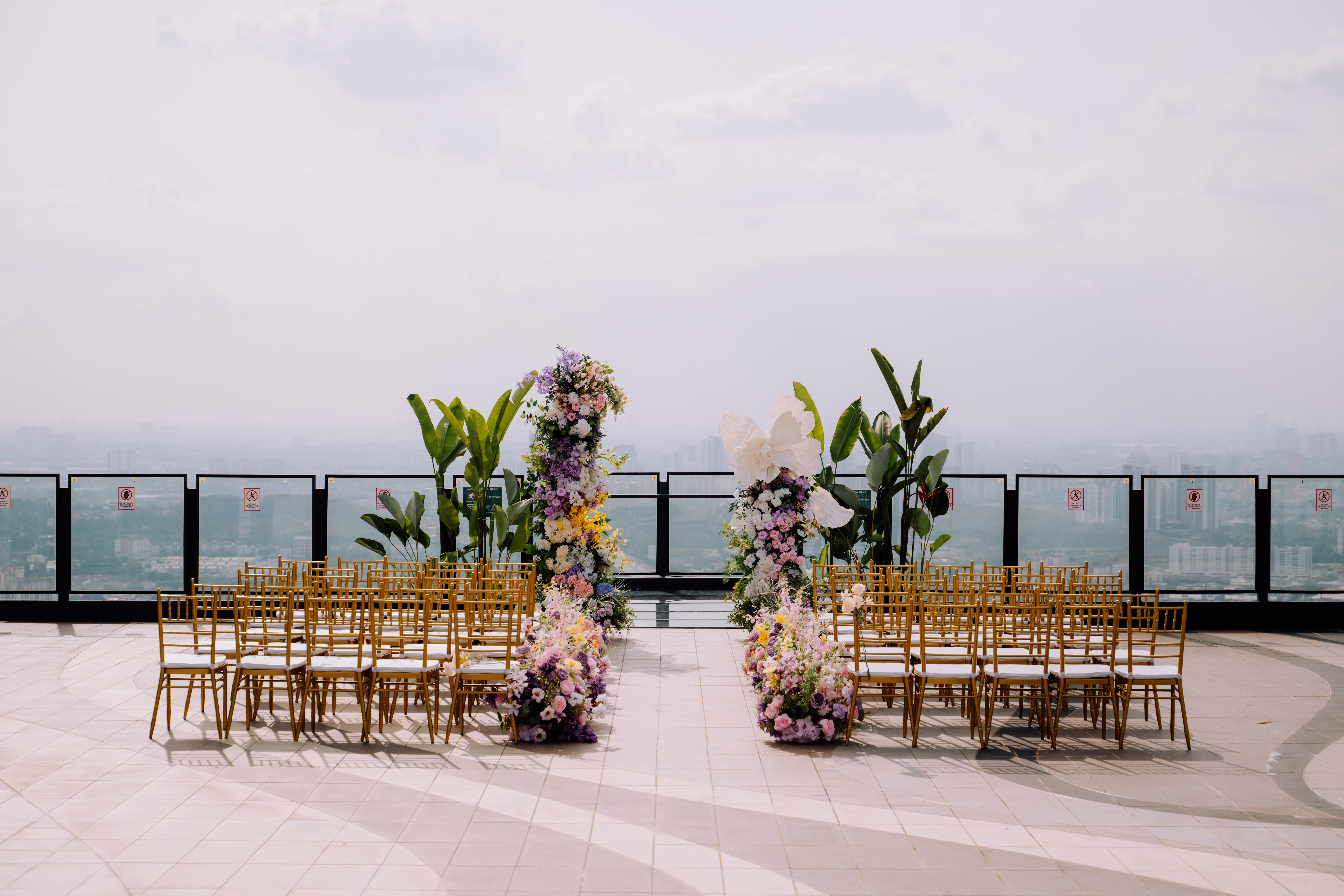 Eric and Jessica exchanging vows on Sky Deck rooftop KL